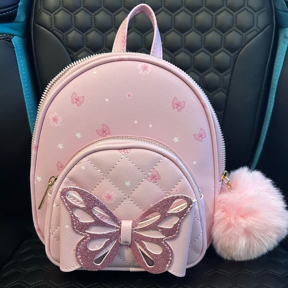 Under One Sky Other - UnderOneSky Pink Butterfly Backpack with Pom Pom (8”x7”x3”)